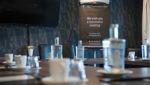 Coffee tea and water facilities with plasmascreen and flipchart
